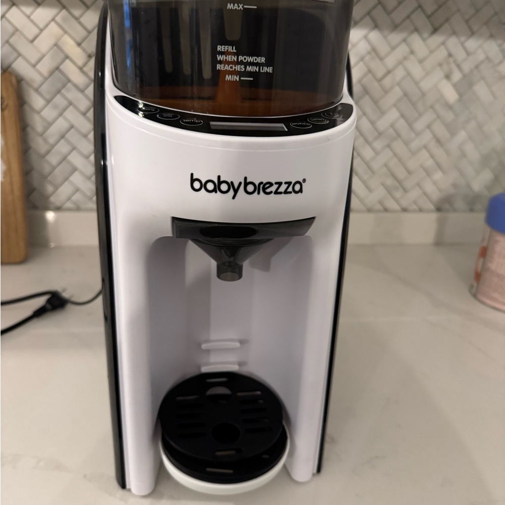 Baby Brezza Formula Dispenser in Black and White